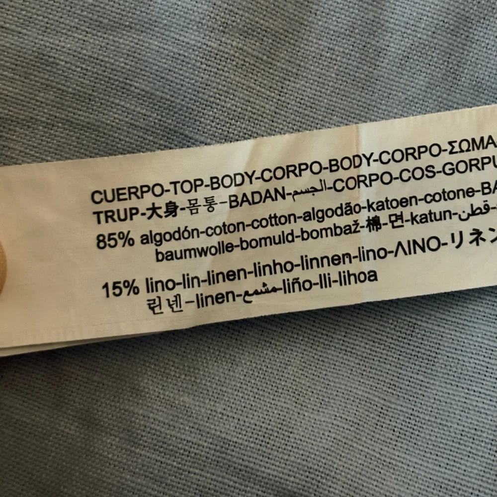 Embroidered Light Blue TRF Dress with Red and Orange Accents - Picture 9 of 9